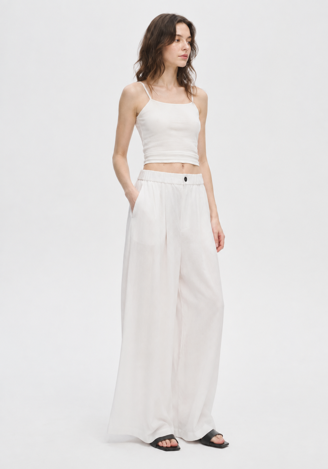 White high-waisted elasticated wide-leg pants