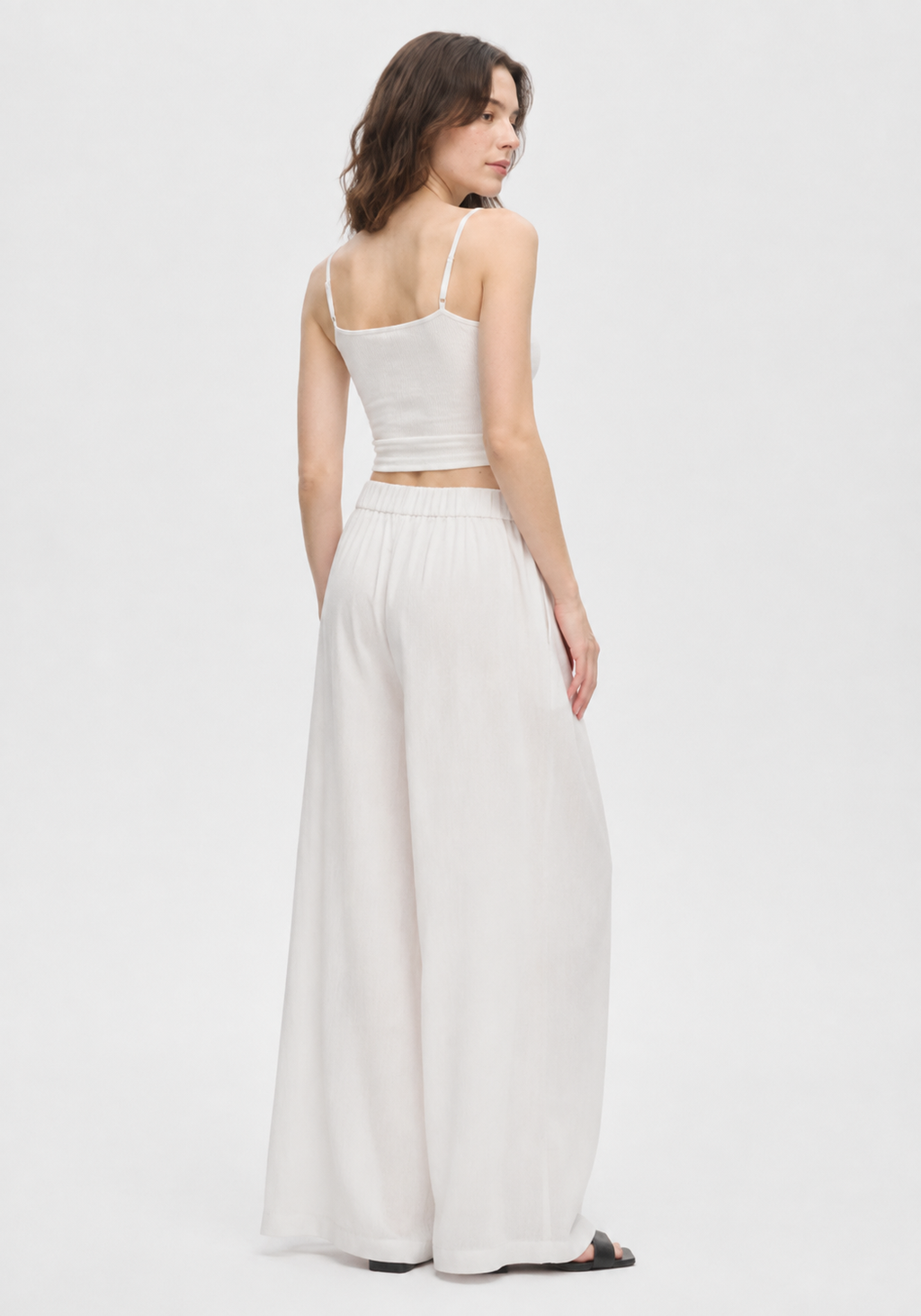 White high-waisted elasticated wide-leg pants
